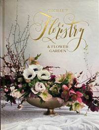 Book cover of 'Lucille's Floristry & Flower Garden' with floral arrangement and gold text.