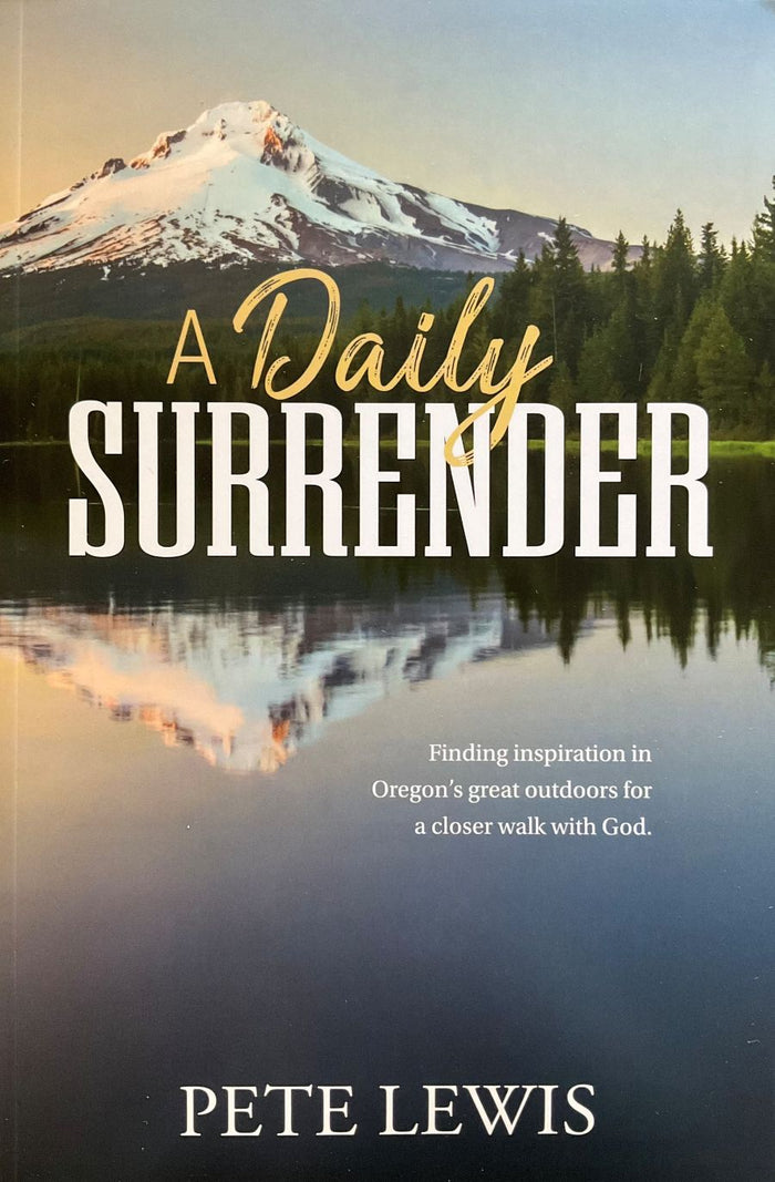 Book cover of 'A Daily Surrender' with a mountain and lake scene.