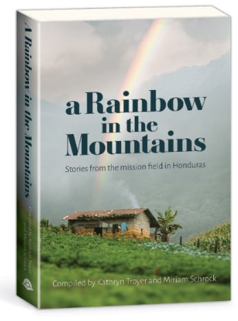 Front cover of A Rainbow in the Mountains by Kathryn Troyer and Miriam Schrock.