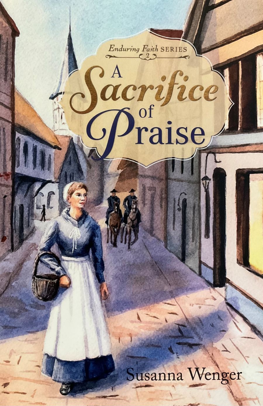 Book cover of 'A Sacrifice of Praise' by Susanna Wenger with a woman walking down a street.