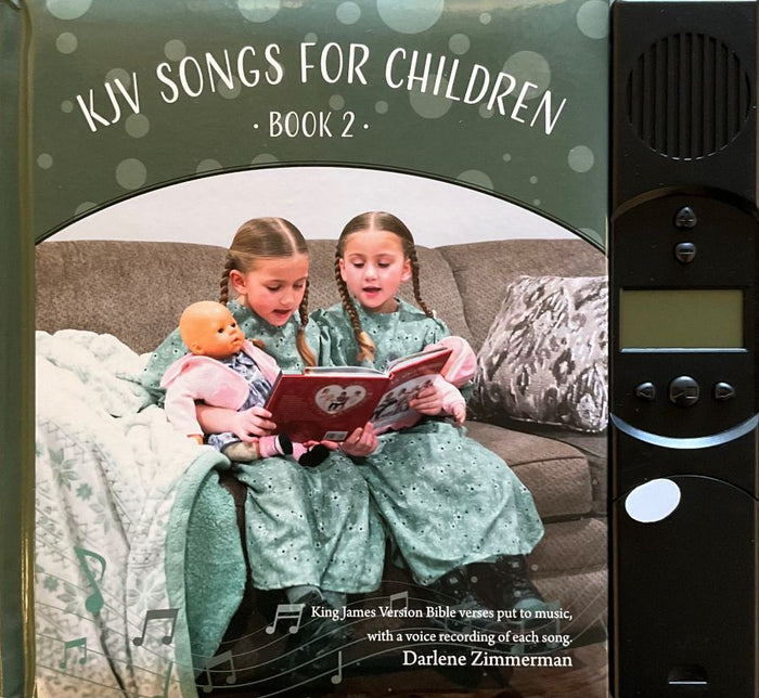 Book titled 'KJV Songs for Children Book 2' with a picture of two children reading a book on a couch, next to a digital device.
