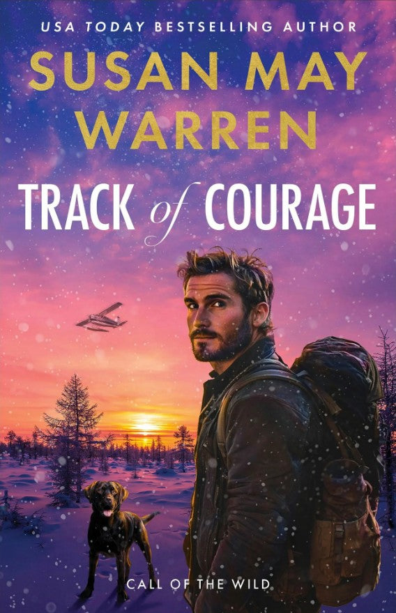 Book cover of 'Track of Courage' by Susan May Warren with a man and dog in a snowy landscape.